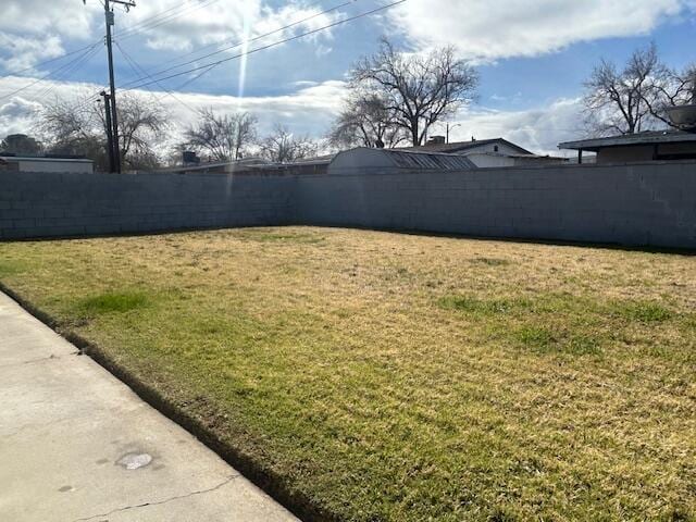 view of yard with fence