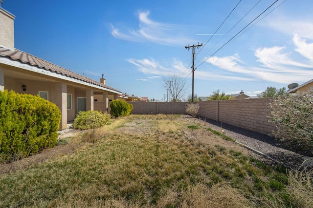 view of yard featuring a fenced backyard