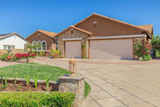 view of front of home featuring a garage