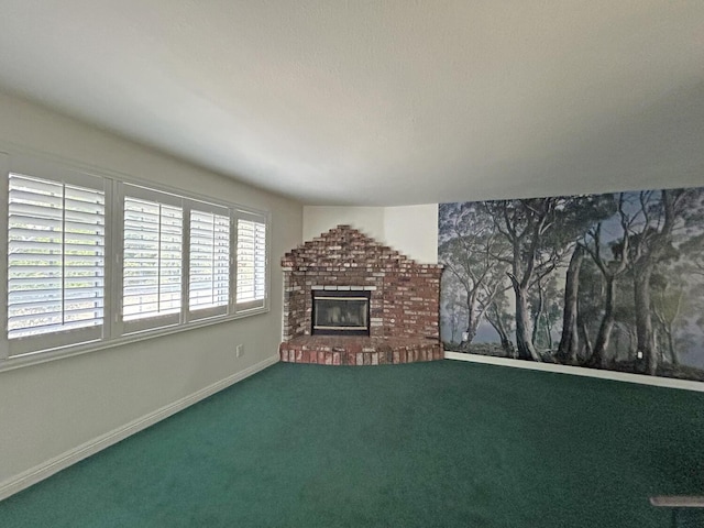 unfurnished living room with a fireplace and carpet