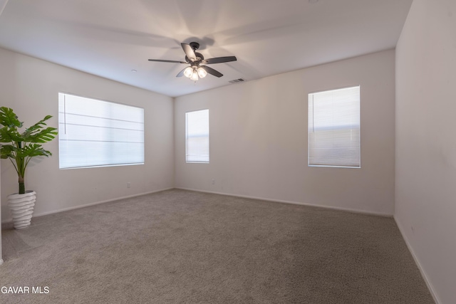 2022 Howard St, Rosamond, CA 93560 - carpeted spare room featuring ceiling fan and baseboards