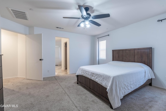 2022 Howard St, Rosamond, CA 93560 - bedroom with light colored carpet and a ceiling fan