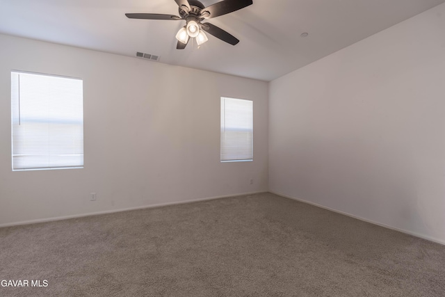 2022 Howard St, Rosamond, CA 93560 - carpeted spare room with a ceiling fan and baseboards
