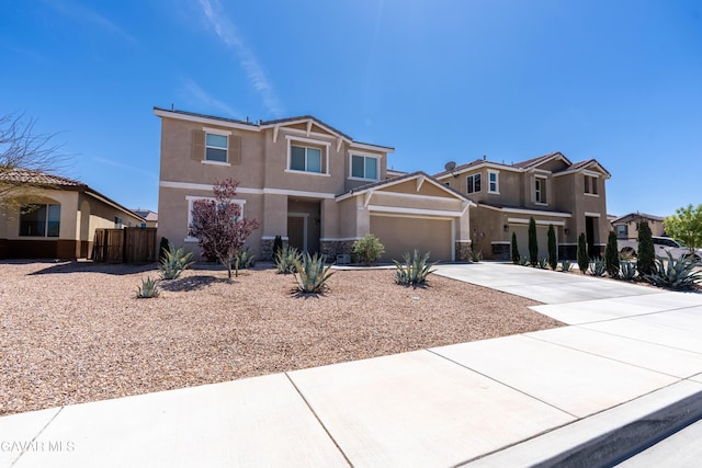 2022 Howard St, Rosamond, CA 93560 - view of front facade featuring stucco siding, concrete driveway, and a garage