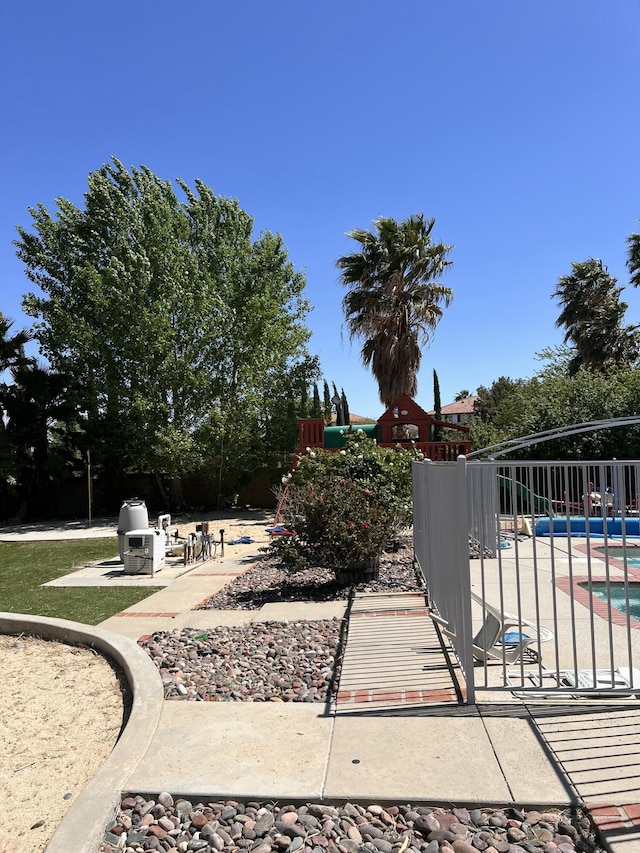 exterior space featuring a patio area and fence