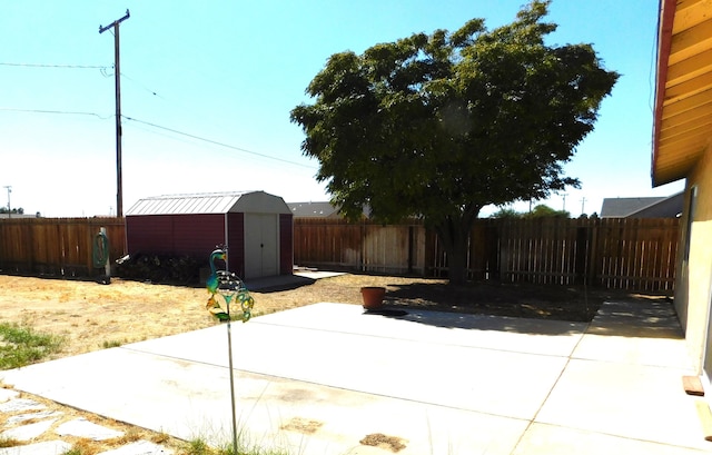 view of patio with a storage unit