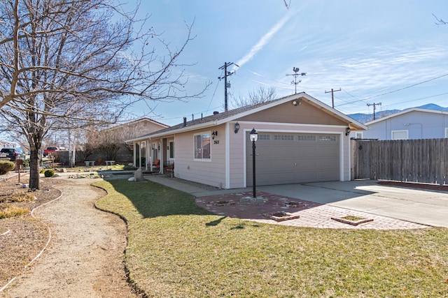 view of side of home featuring a lawn