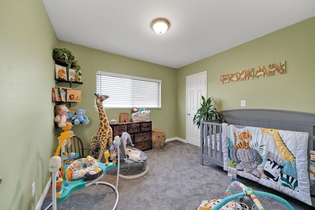 carpeted bedroom featuring baseboards