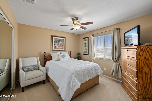 39243 Nicole Dr, Palmdale, CA 93551 - bedroom featuring light colored carpet, a closet, and ceiling fan