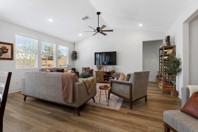 living area with ceiling fan, wood finished floors, vaulted ceiling, recessed lighting, and baseboards