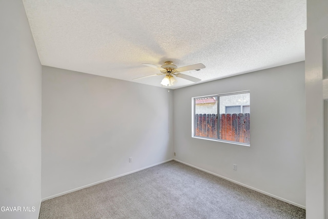 3524 San Jacinto Ave, Rosamond, CA 93560 - unfurnished room with a ceiling fan, carpet flooring, and a textured ceiling