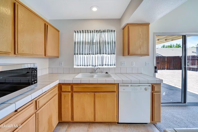 3524 San Jacinto Ave, Rosamond, CA 93560 - kitchen with dishwasher, stainless steel microwave, light countertops, recessed lighting, and light brown cabinets