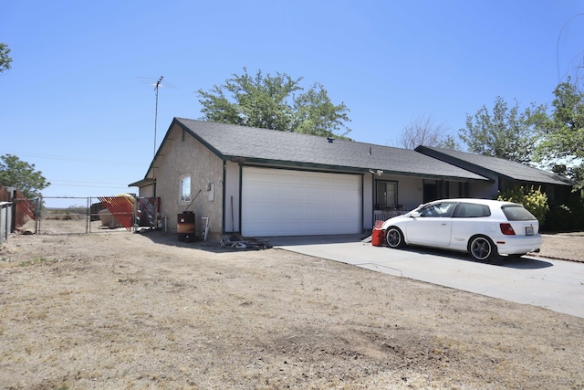 39928 E 179th St, Palmdale, CA 93591 - view of front of property with an attached garage and concrete driveway