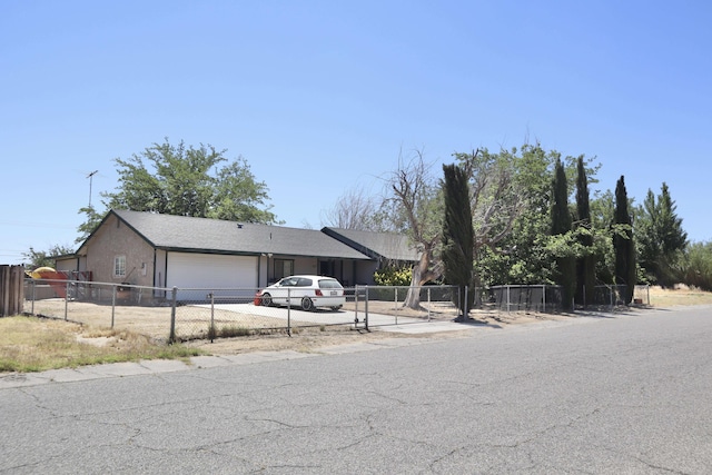 39928 E 179th St, Palmdale, CA 93591 - view of front of property featuring an attached garage and concrete driveway