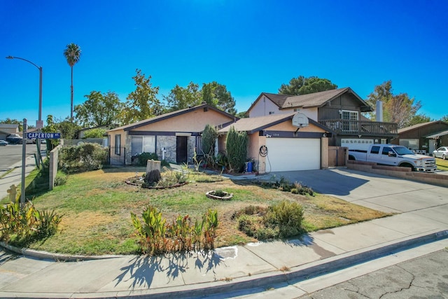 view of front facade featuring a garage and a front yard