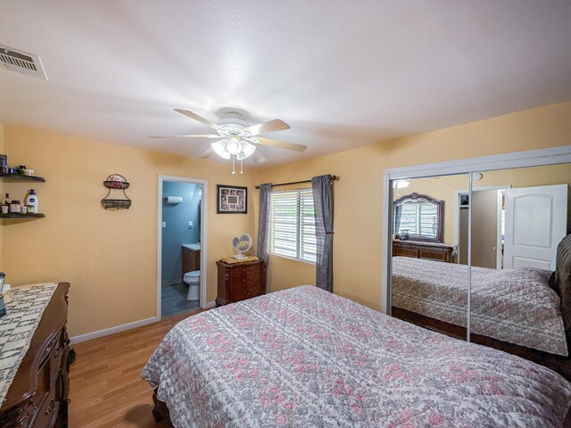 45431 Sancroft Ave, Lancaster, CA 93535 - bedroom featuring light wood-style floors, baseboards, a ceiling fan, and ensuite bathroom