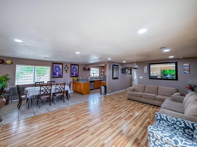 45431 Sancroft Ave, Lancaster, CA 93535 - living room with recessed lighting and light wood finished floors