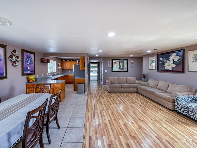45431 Sancroft Ave, Lancaster, CA 93535 - living room featuring recessed lighting and light tile patterned flooring