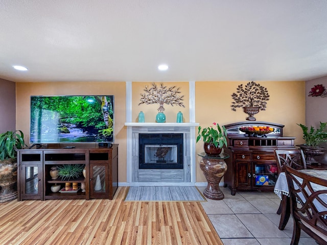 45431 Sancroft Ave, Lancaster, CA 93535 - living room with a tiled fireplace and recessed lighting