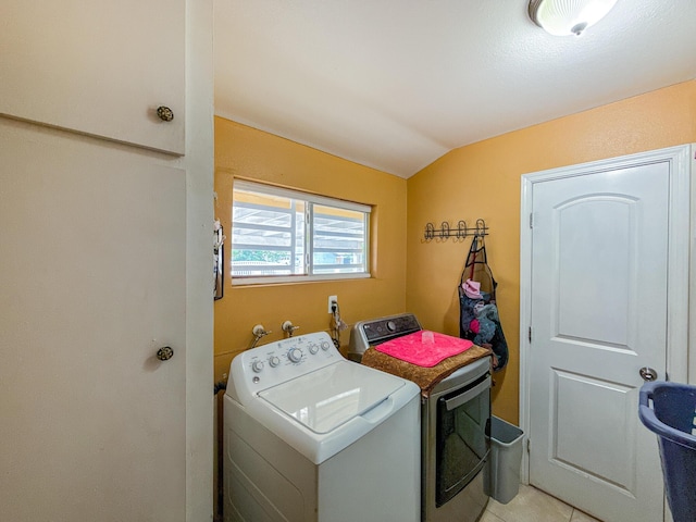 45431 Sancroft Ave, Lancaster, CA 93535 - laundry area featuring washer and clothes dryer and light tile patterned floors