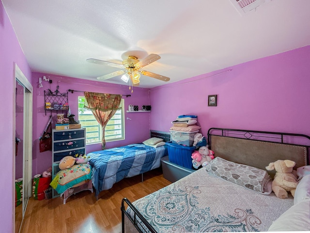 45431 Sancroft Ave, Lancaster, CA 93535 - bedroom featuring wood finished floors and a ceiling fan