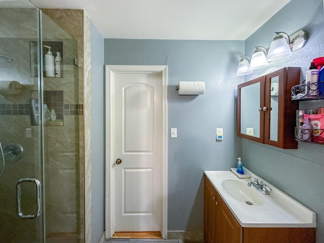 45431 Sancroft Ave, Lancaster, CA 93535 - bathroom featuring a stall shower and vanity