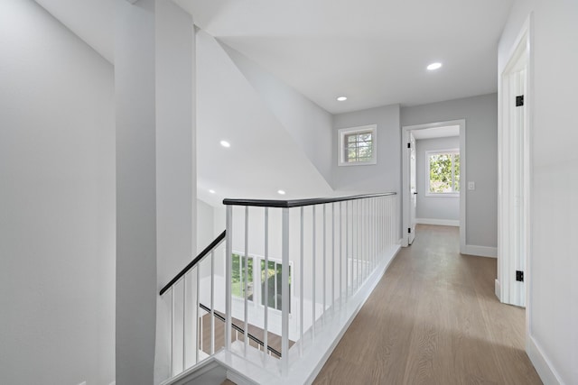 4046 Kona Ct, Palmdale, CA 93552 - hall with an upstairs landing, wood finished floors, and recessed lighting