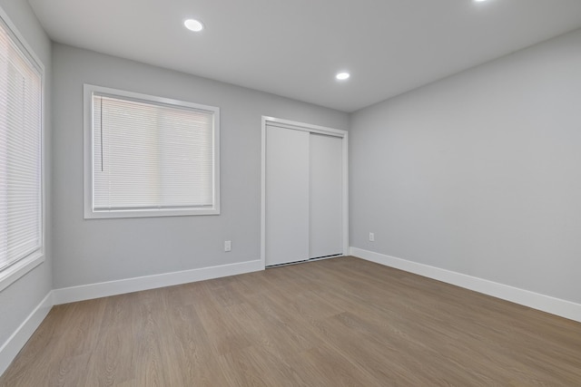 4046 Kona Ct, Palmdale, CA 93552 - unfurnished bedroom featuring wood finished floors, recessed lighting, and a closet