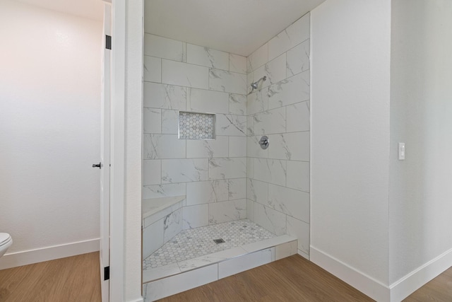 4046 Kona Ct, Palmdale, CA 93552 - bathroom with tiled shower and wood finished floors