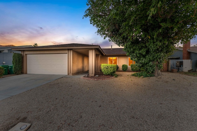 view of front of home with a garage