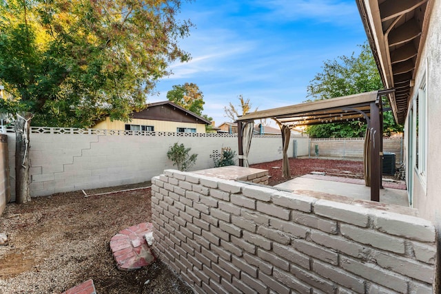 view of patio with central AC unit