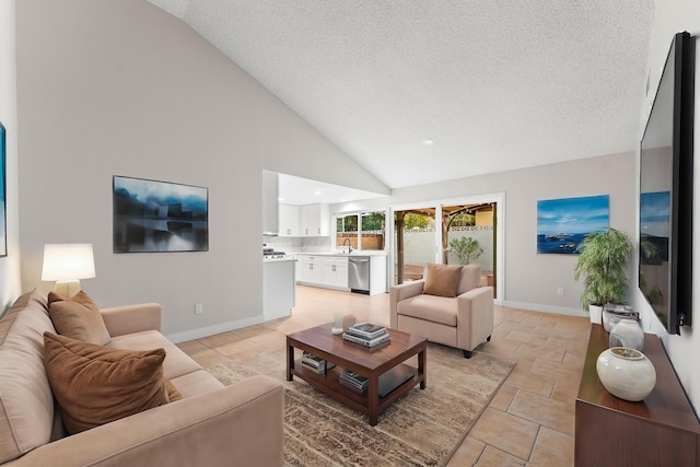 living room featuring a textured ceiling and high vaulted ceiling