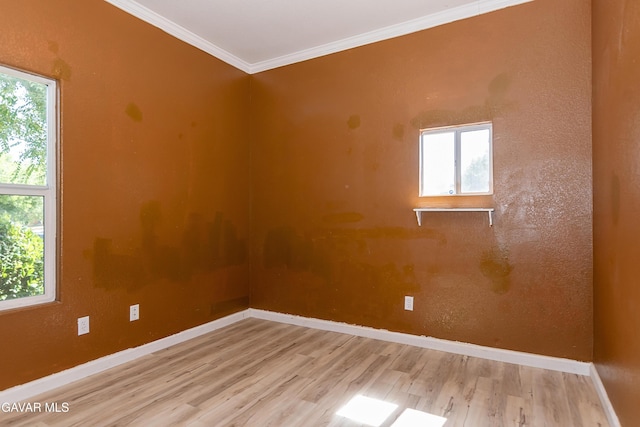 43963 Glenraven Rd, Lancaster, CA 93535 - spare room featuring wood finished floors and ornamental molding