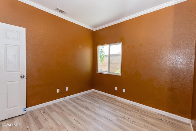 43963 Glenraven Rd, Lancaster, CA 93535 - spare room featuring light wood-style floors and ornamental molding