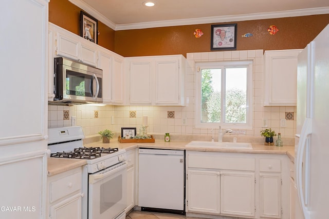 43963 Glenraven Rd, Lancaster, CA 93535 - kitchen featuring white appliances, white cabinetry, ornamental molding, and recessed lighting