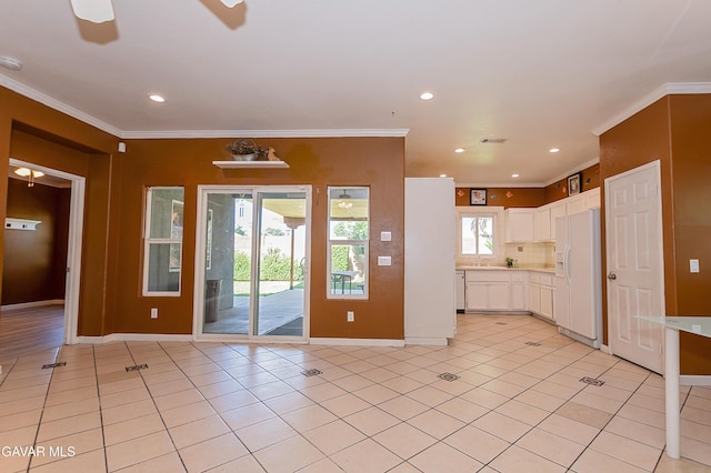 43963 Glenraven Rd, Lancaster, CA 93535 - doorway to outside featuring crown molding, light tile patterned flooring, recessed lighting, and ceiling fan