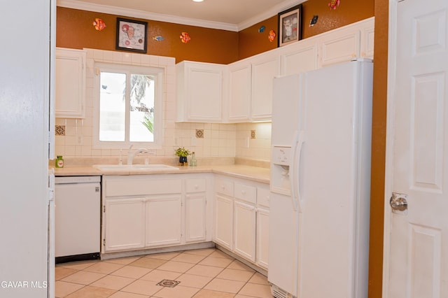 43963 Glenraven Rd, Lancaster, CA 93535 - kitchen with white appliances, light countertops, tasteful backsplash, light tile patterned floors, and ornamental molding