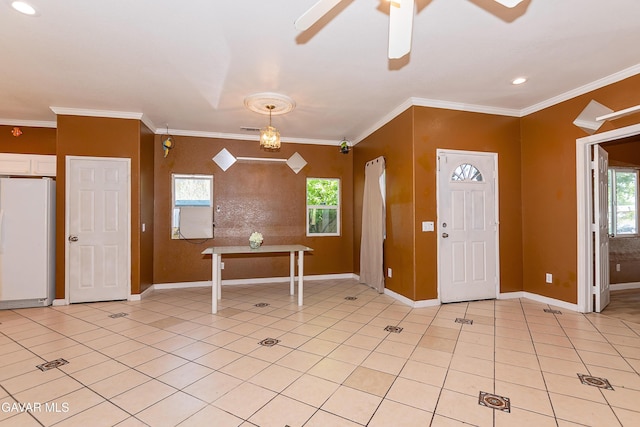 43963 Glenraven Rd, Lancaster, CA 93535 - foyer featuring plenty of natural light, a ceiling fan, light tile patterned flooring, crown molding, and recessed lighting