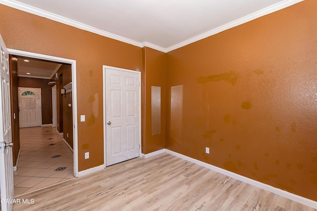 43963 Glenraven Rd, Lancaster, CA 93535 - unfurnished bedroom with crown molding and light wood-style floors