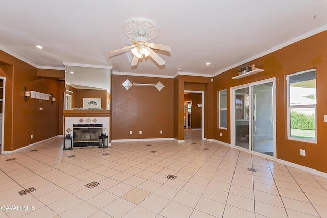 43963 Glenraven Rd, Lancaster, CA 93535 - unfurnished living room featuring ceiling fan, recessed lighting, ornamental molding, a glass covered fireplace, and light tile patterned flooring