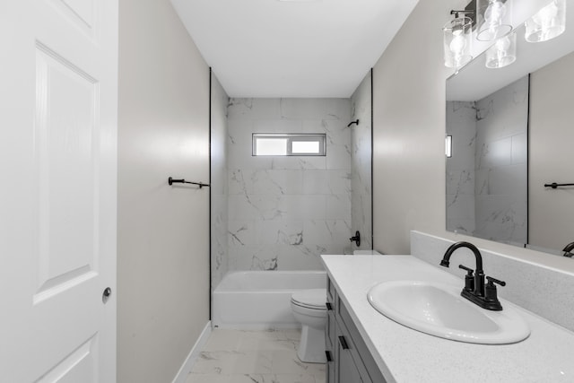 full bathroom with vanity, toilet, and tiled shower / bath