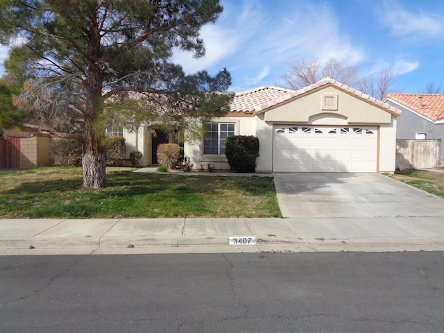 view of front facade featuring a garage, a tile roof, concrete driveway, stucco siding, and a front yard