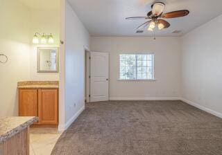 unfurnished bedroom with light colored carpet