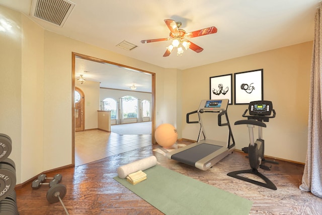 workout room featuring ceiling fan