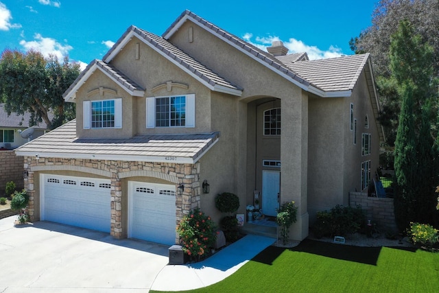 traditional-style house with an attached garage, a tile roof, stone siding, stucco siding, and concrete driveway