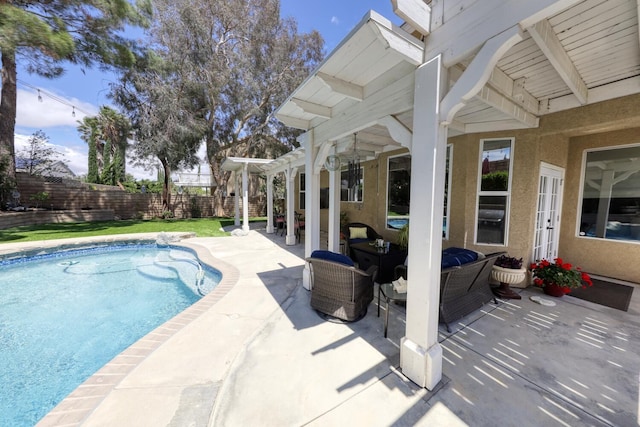 view of pool featuring a fenced backyard, a fenced in pool, and a patio