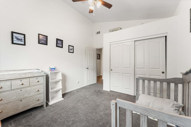 bedroom with visible vents, a closet, dark colored carpet, baseboards, and ceiling fan