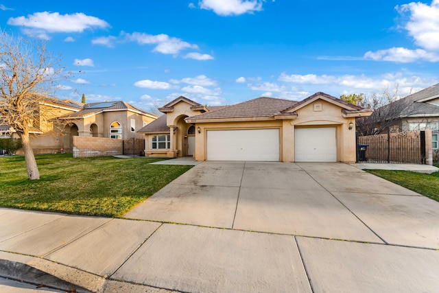 view of front of home featuring stucco siding, driveway, fence, a front yard, and a garage