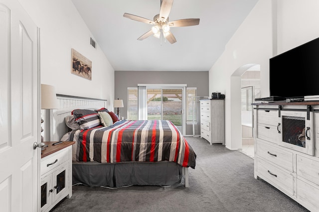 carpeted bedroom featuring high vaulted ceiling, arched walkways, visible vents, and ceiling fan