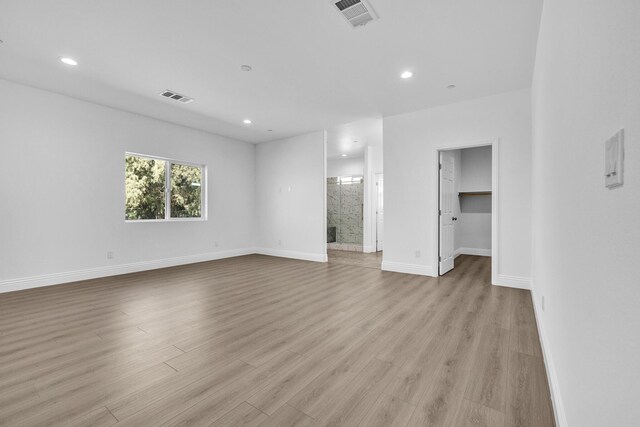 2929 W 28th St, Rosamond, CA 93560 - spare room featuring light wood-style floors, recessed lighting, and baseboards